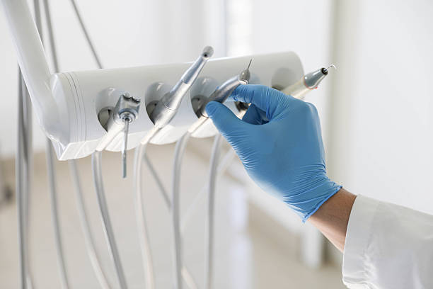 Professional Tooth Extraction technician working in Garden City, SC